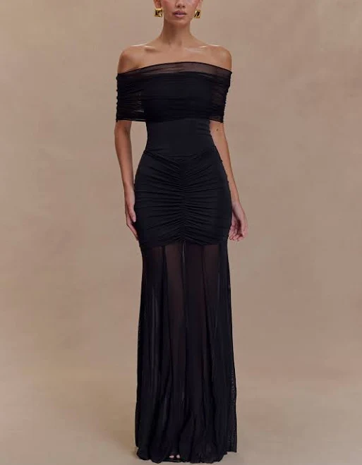 Off-shoulder flowy maxi dress with a sunset orange to pink ombre gradient