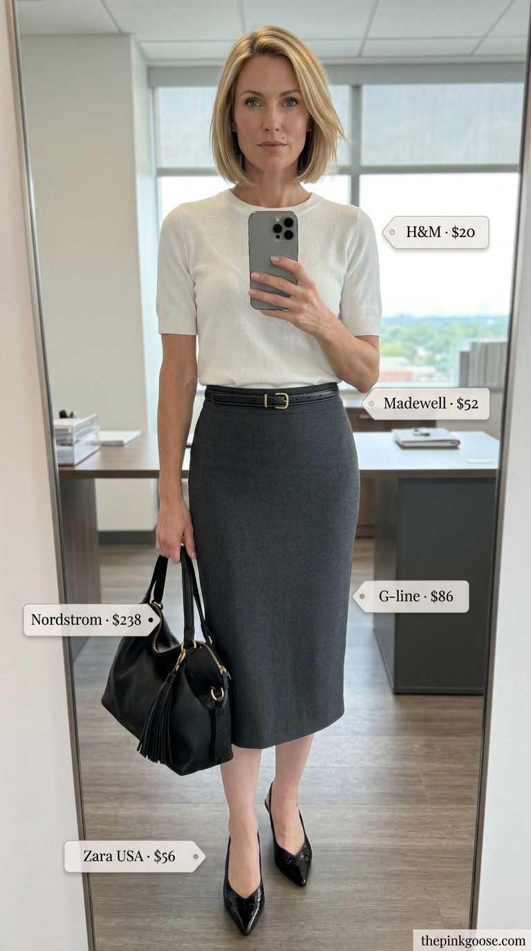 Sophisticated summer linen business casual outfit for women 2026: charcoal pencil skirt, white knit top & black heels.