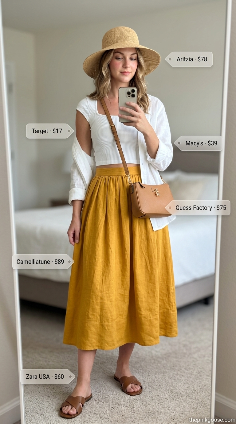 Summer Linen Shirt Outfits for Women 2026: Mustard yellow linen skirt, white crop top, and straw hat.