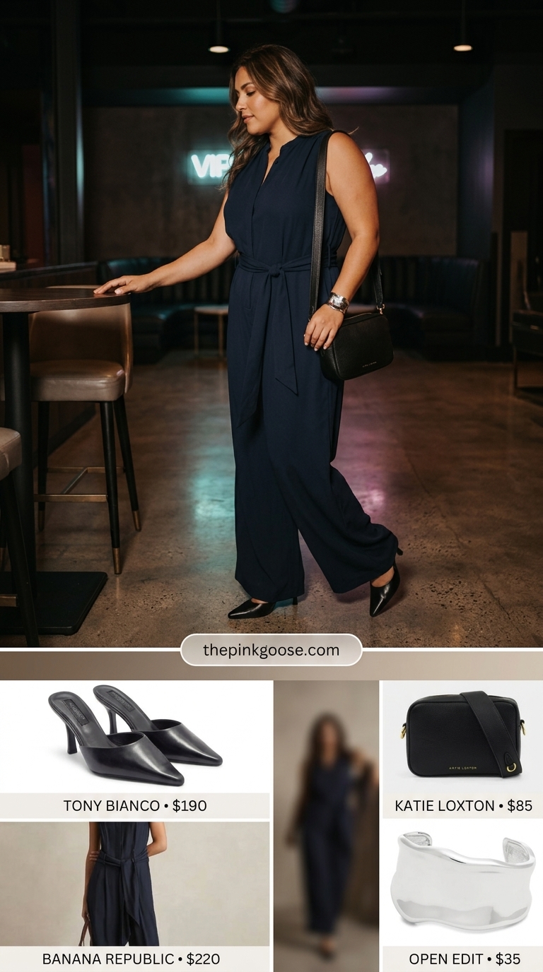 Summer night out downtown outfits for women 2026: Navy wide-leg jumpsuit, black crossbody, and heeled mules.