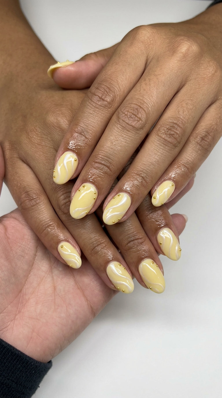 Cute Summer Nails 2026: Sweet Pearlescent Butter Swirl Cute summer nails 2026: Pearlescent butter swirl with gold accents on medium soft square nails for a whimsical, sweet look.