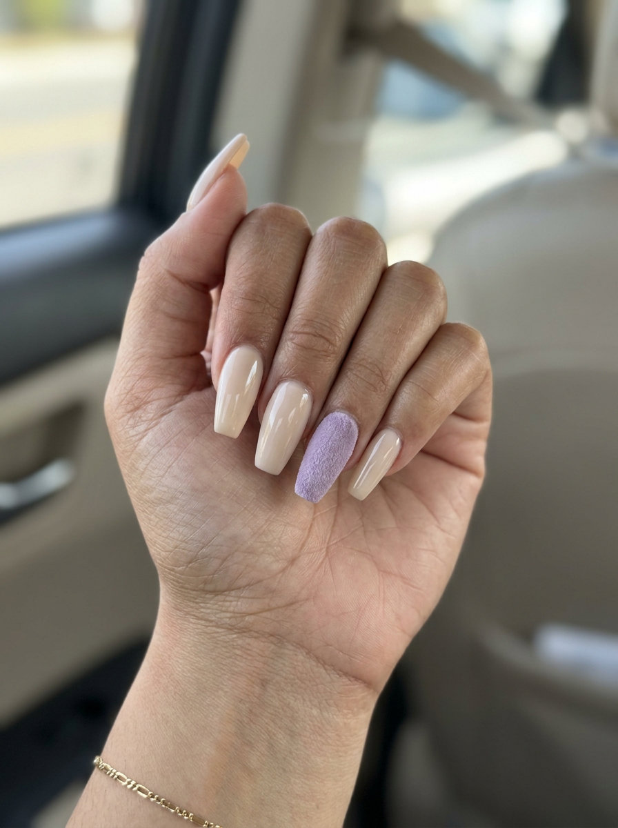 Velvet Lavender Manicure Colors Summer 2026 Velvet lavender and glossy neutral manicure colors summer 2026 for formal events. Medium coffin nails.