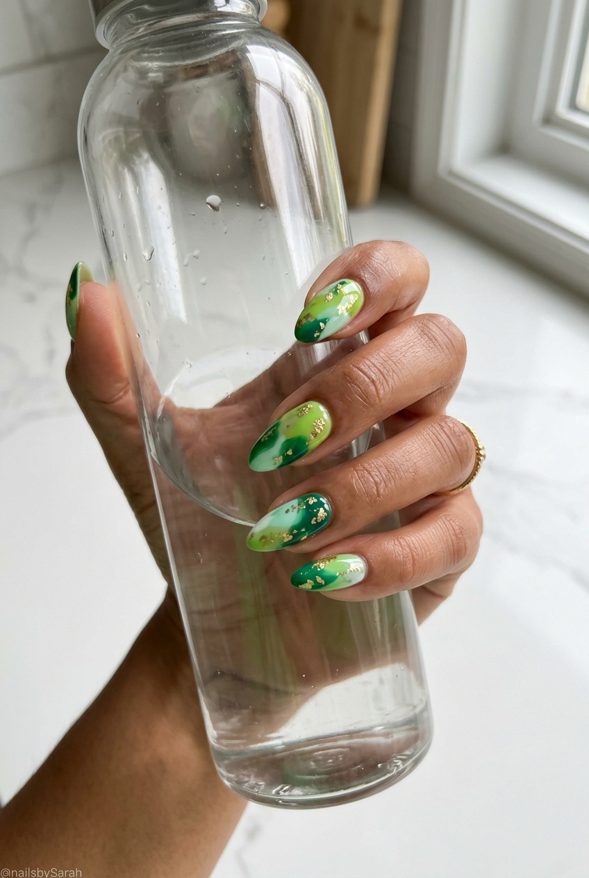 Pretty Green Nails 2026: Abstract Multicolor Green Pretty green nails 2026: Abstract multicolor green with gold foil, ideal for parties and creative events.