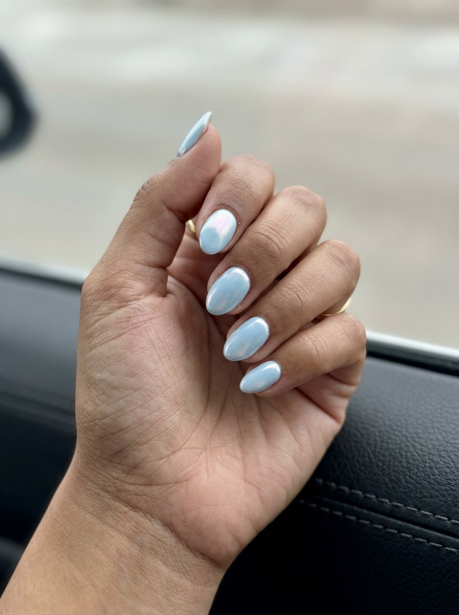Pale Sky Blue Glazed nails: glamorous, ethereal short almond nails with pearlescent shift for date nights 2026.