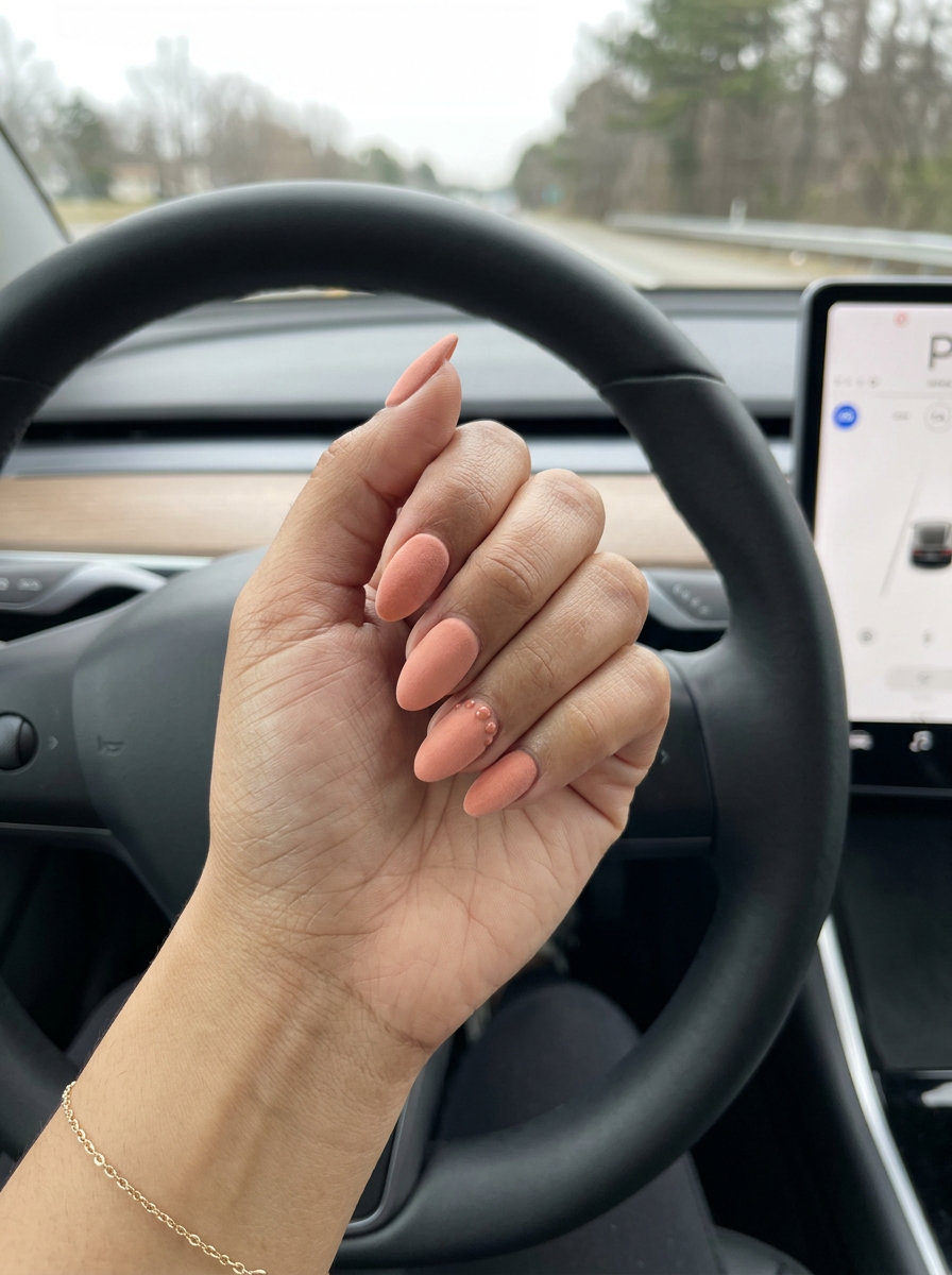 Peach Velvet Almond Nails 2026: Romantic Dreams Velvet peach almond nails with muted rose undertones for a romantic outing, a soft choice for solid summer nails 2026.