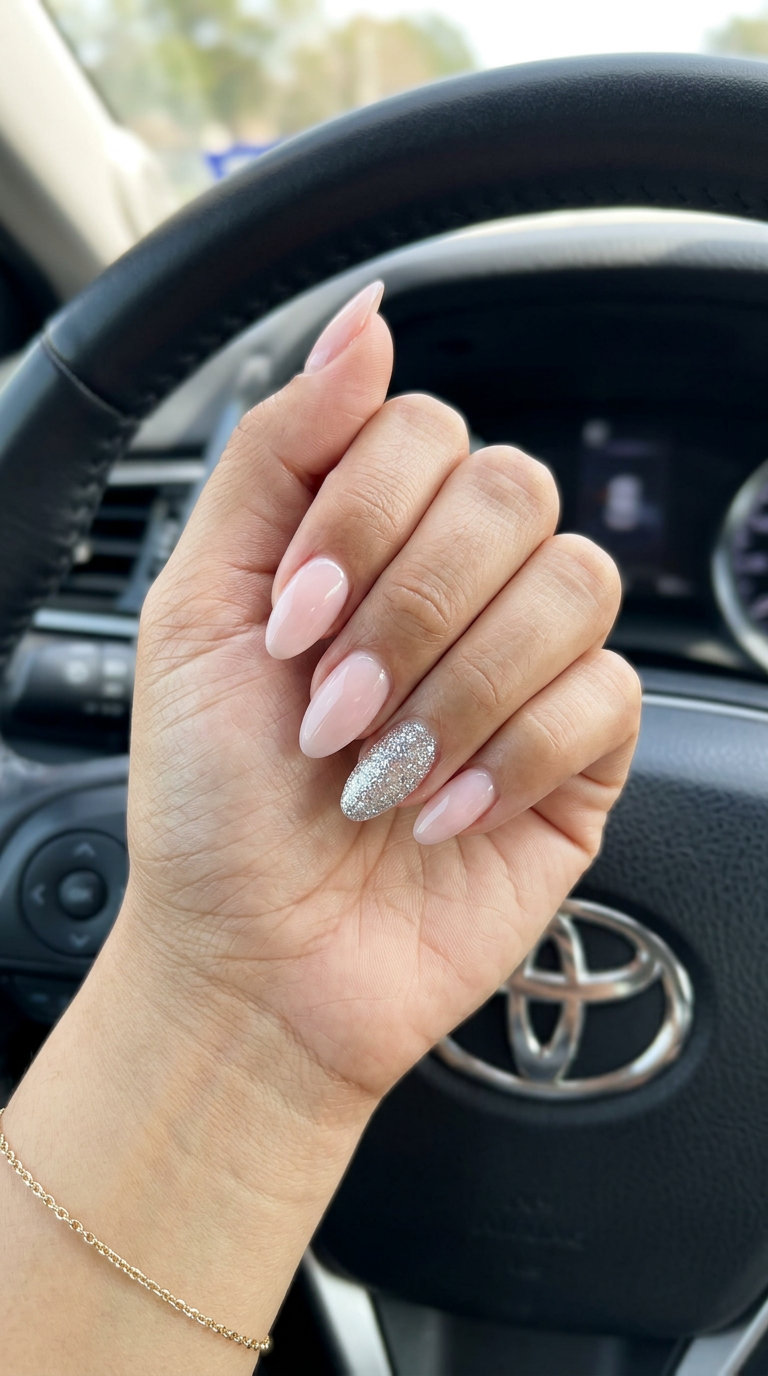 Silver Glitter Accent Almond - Summer Acrylic Nails 2026 Silver Glitter Accent Almond: Glamorous summer acrylic nails 2026 for date nights & parties. Chic.