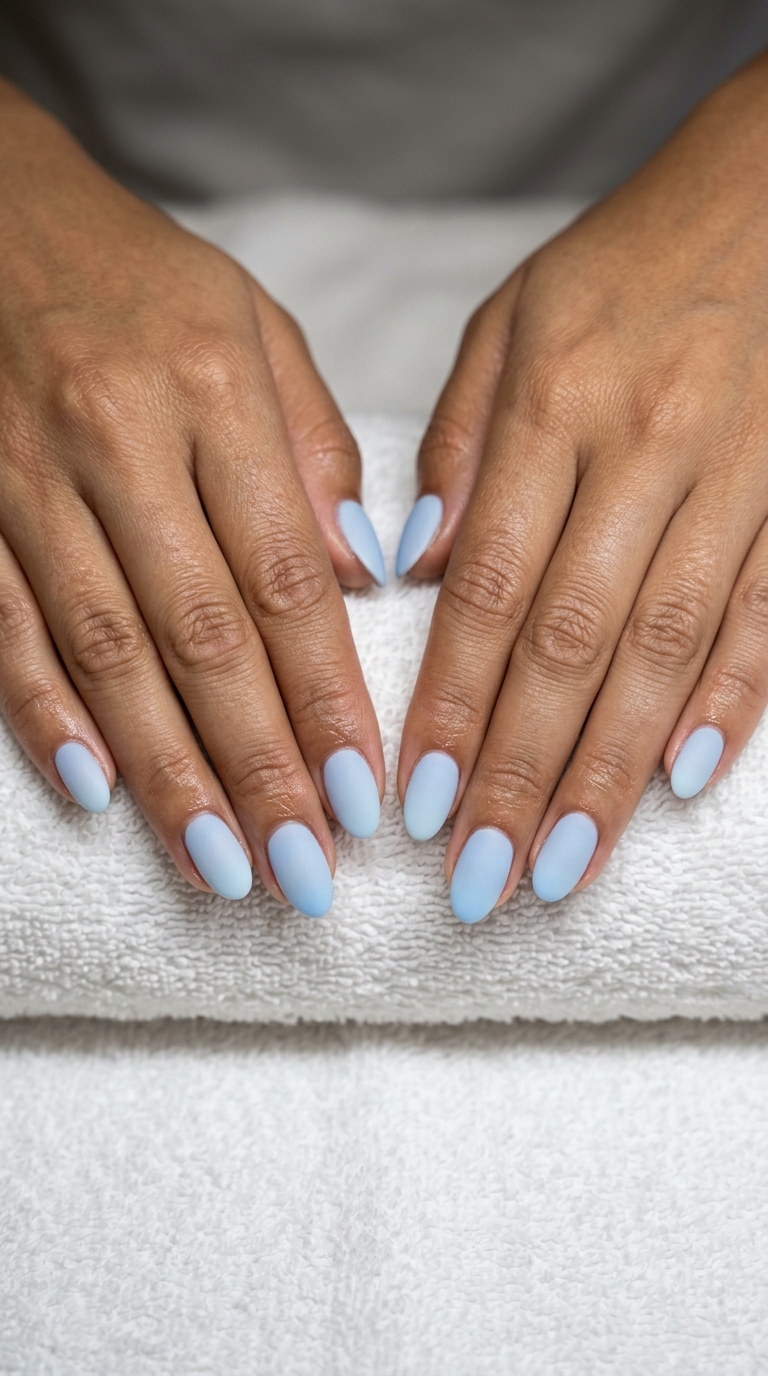 Pastel Blue Velvet Gradient Oval Nails 2026 Pastel blue velvet gradient oval acrylic nails for a romantic evening in summer 2026.