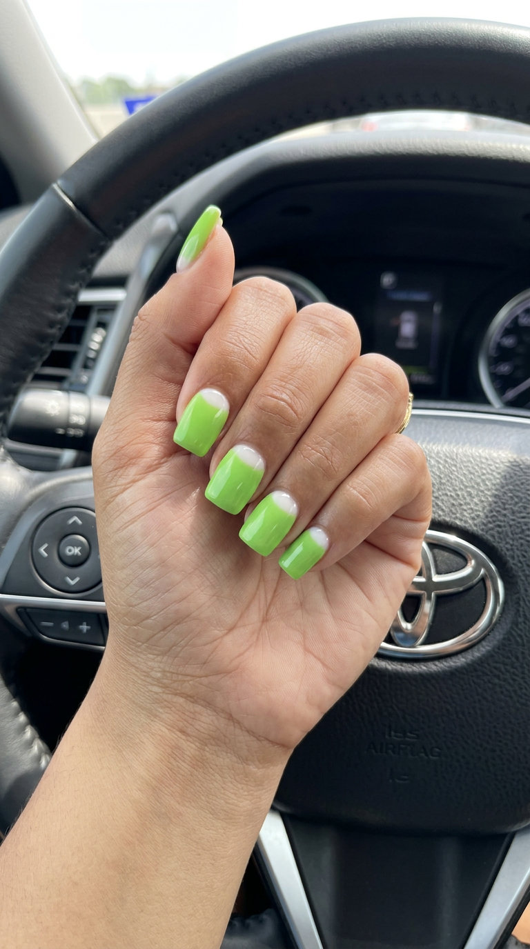 Playful zesty lime reverse French nails for summer dip nails 2026, great for casual weekends and vacations.