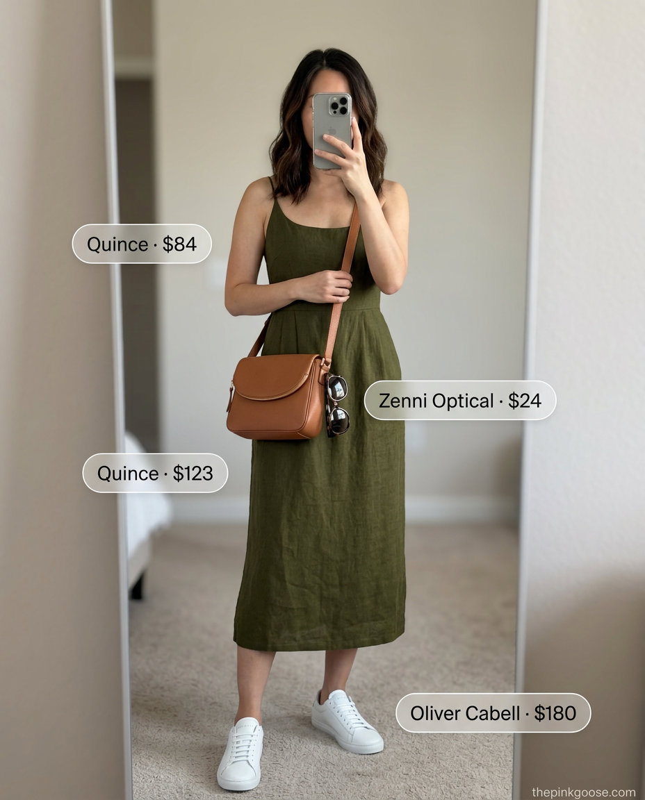 Khaki linen dress styled for city exploration with a crossbody bag, tortoise shell sunglasses, and white sneakers. Summer Linen Shirt Open Over Dress Outfits 2026.