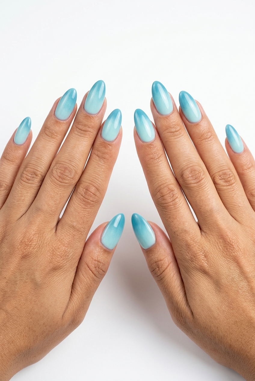 Oceanic Aura: Summer Nail Colors 2026 Ethereal aqua blue aura gradient on long ballerina nails. Dreamy summer nail colors 2026.