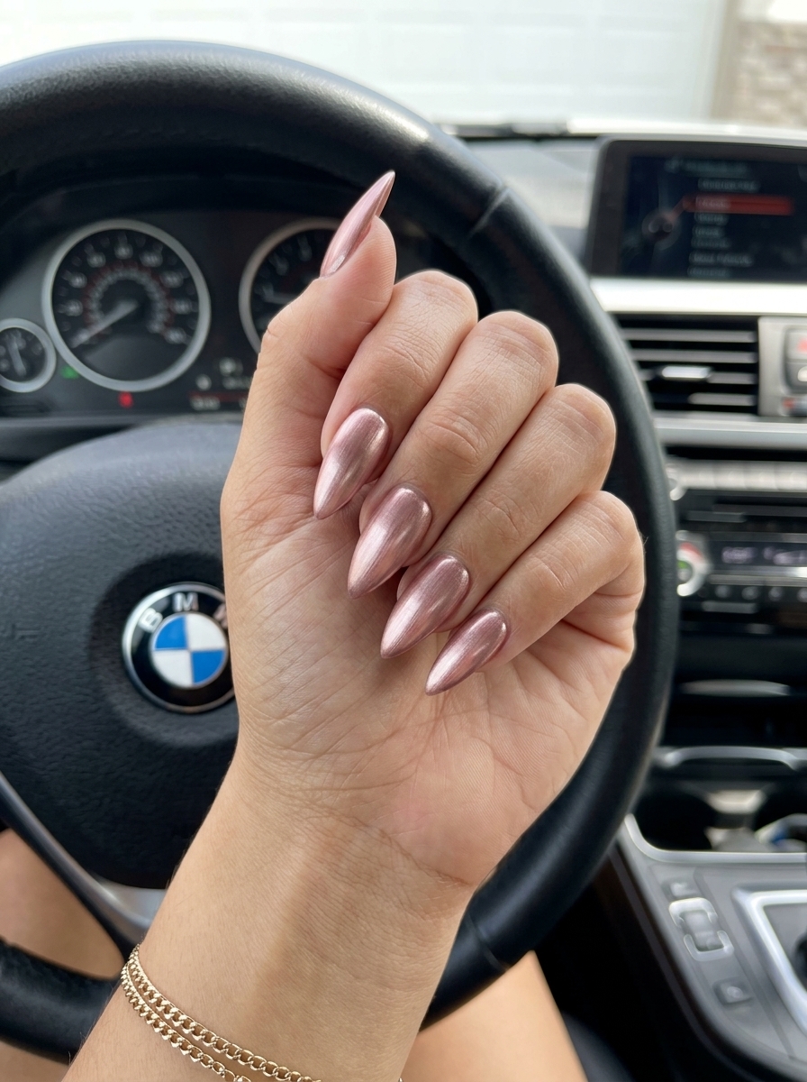 Rose Gold Mirage Nails 2026: Glamorous Muted rose gold brushed metallic nails for a glamorous evening look. Summer nail colors 2026.