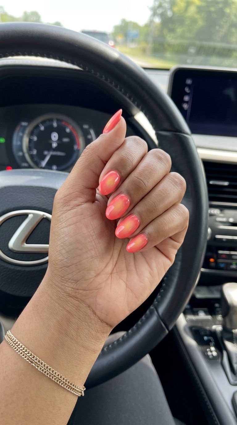 Vibrant coral aura glow nails for summer 2026, ideal for festivals, parties, and vacations.