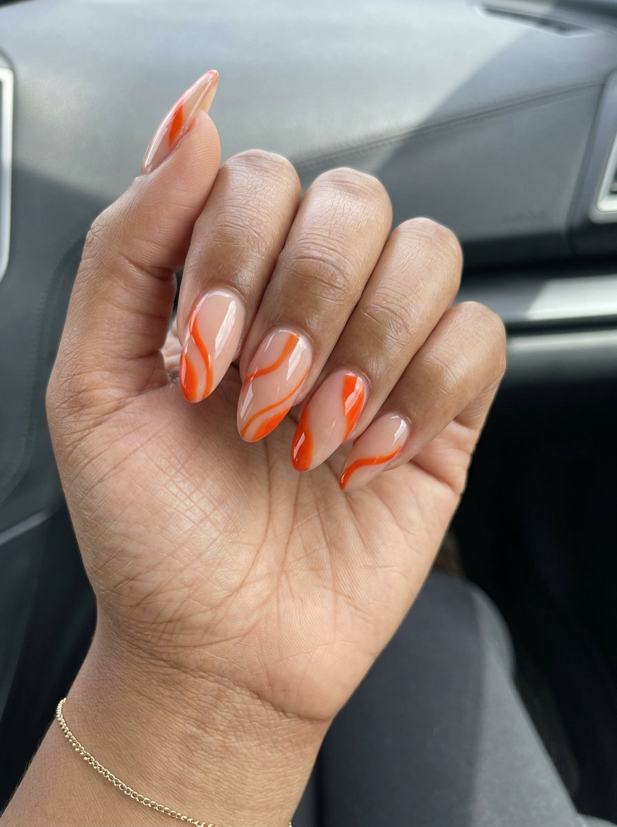 Edgy fiery orange abstract line nails for summer nails for brown skin tone 2026, great for festivals.