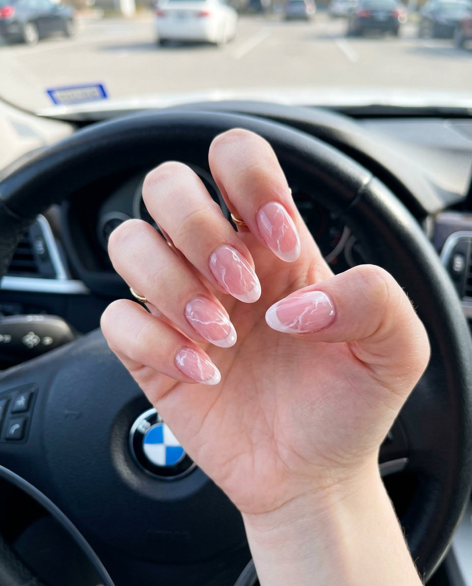 Sheer Pink Marble French Tips 2026: Wedding Guest Style Sheer pink marble French tip nails for summer 2026, elegant for weddings and bridal showers.