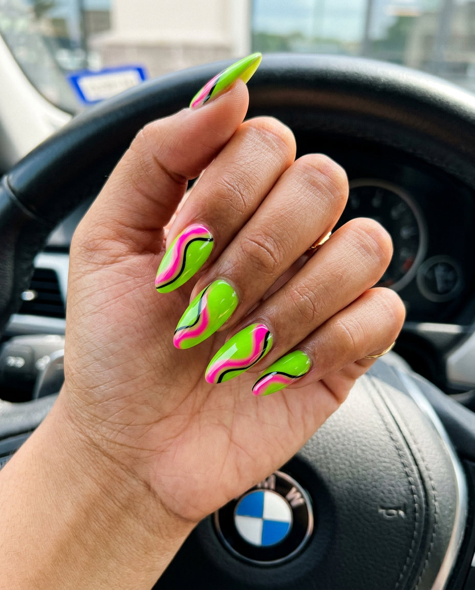 Electric lime green and hot pink rainbow swirl nails 2026 for parties, festivals, or nights out. Edgy, bold coffin shape.