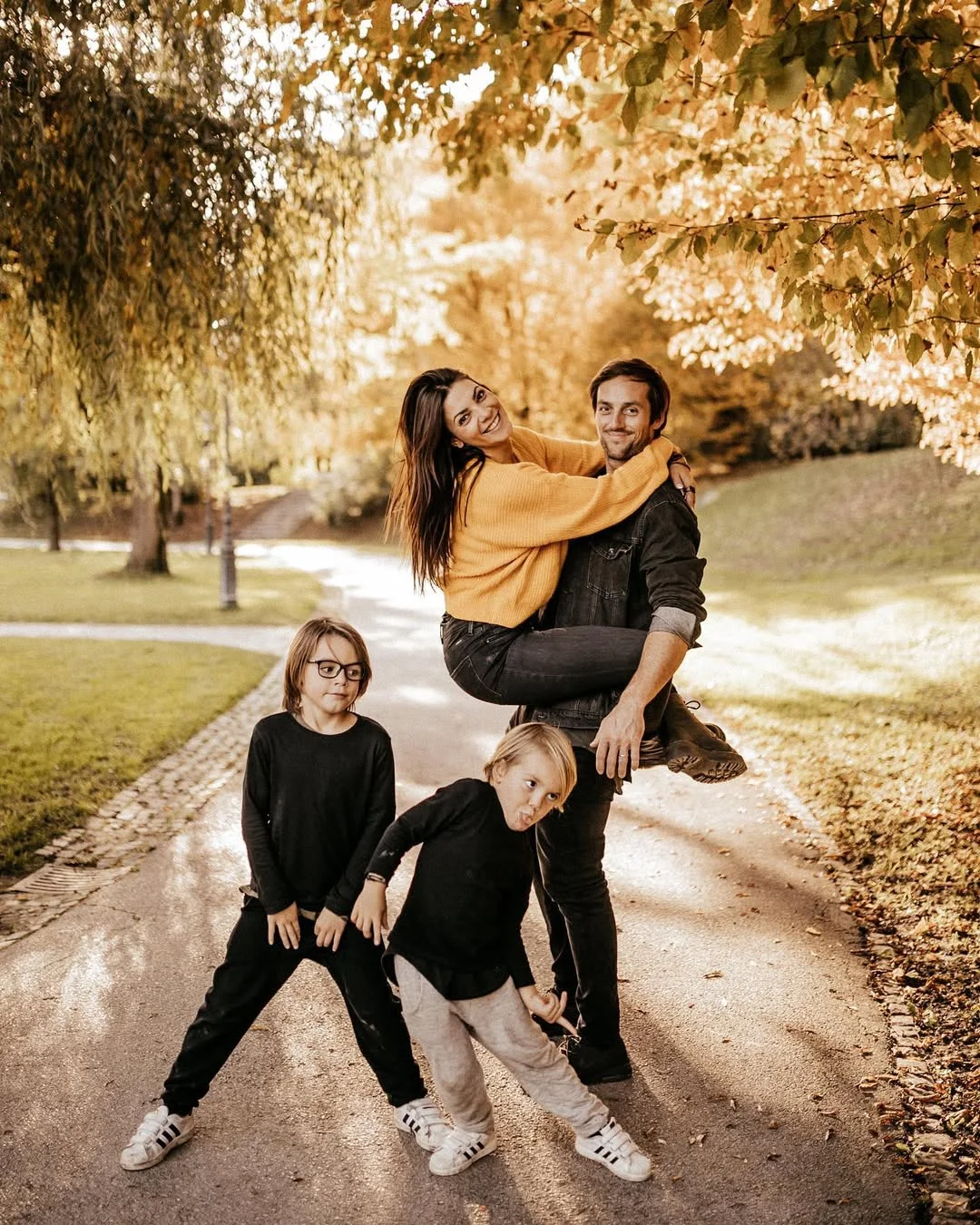 beautiful fall family picture outfits 2026 Black Basics and Mustard Accents for Playful Autumn Style