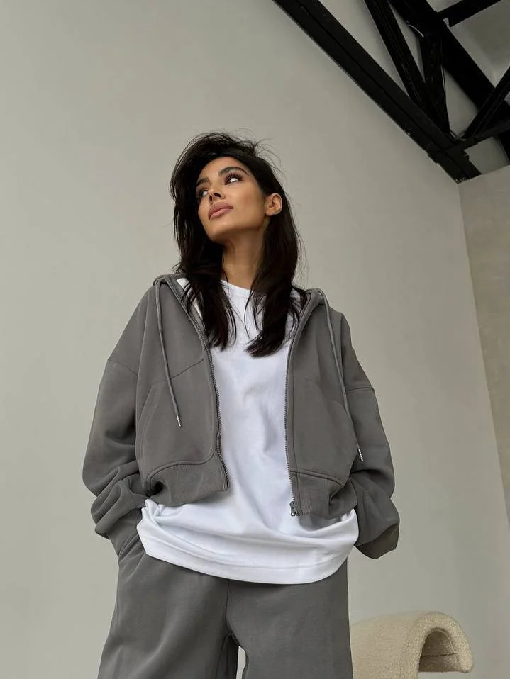 chic fall travel wardrobe for women 2026 Modern Grey Layers That Work Everywhere