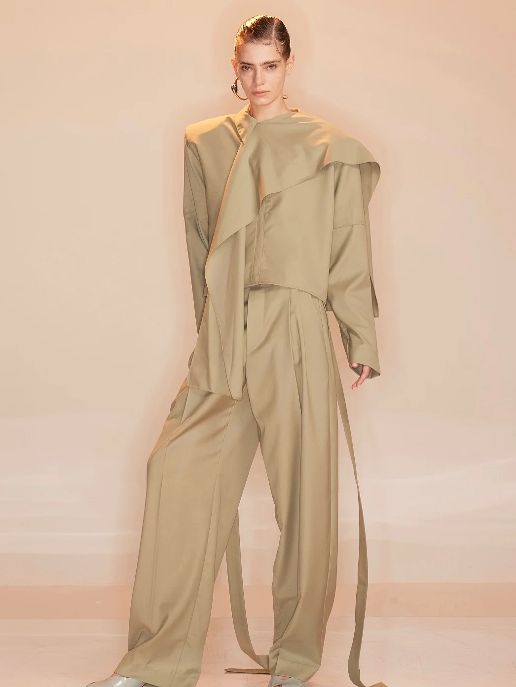 chic fall travel wardrobe for women 2026 Soft Neutrals with Architectural Lines