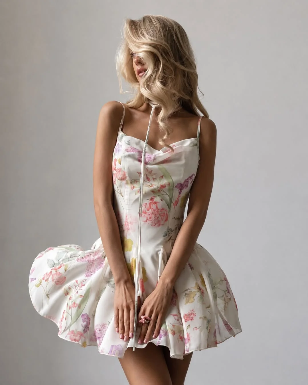 chic july fashion trends 2026 Garden Party Florals with Sculptural Charm