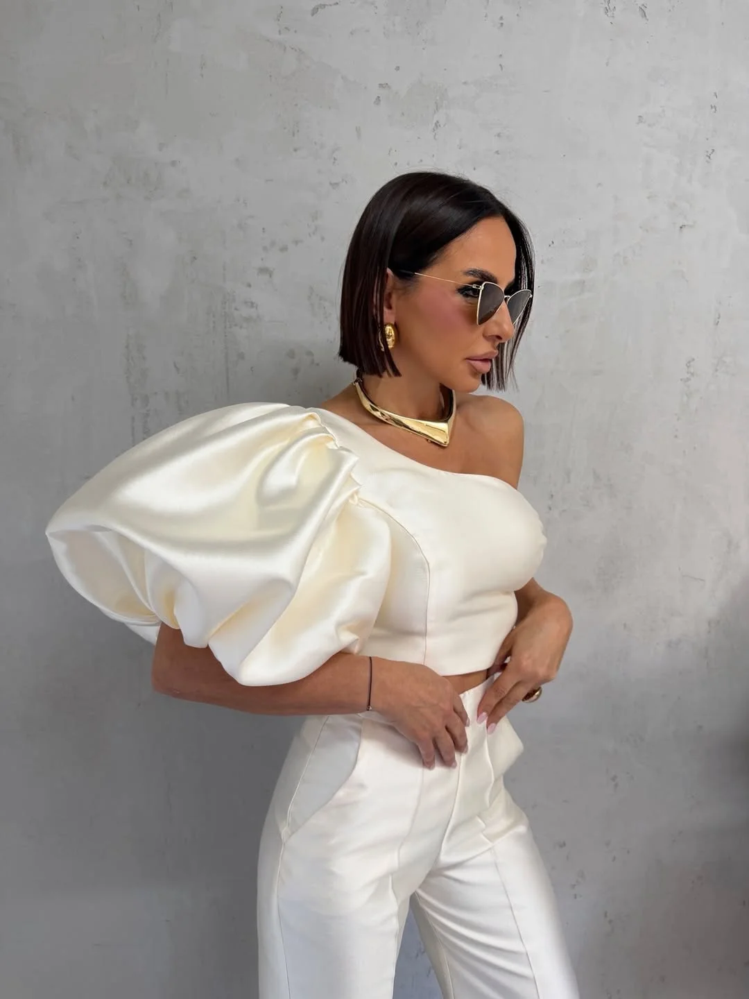 chic july fashion trends 2026 Statement Puff Sleeves and Contemporary Elegance