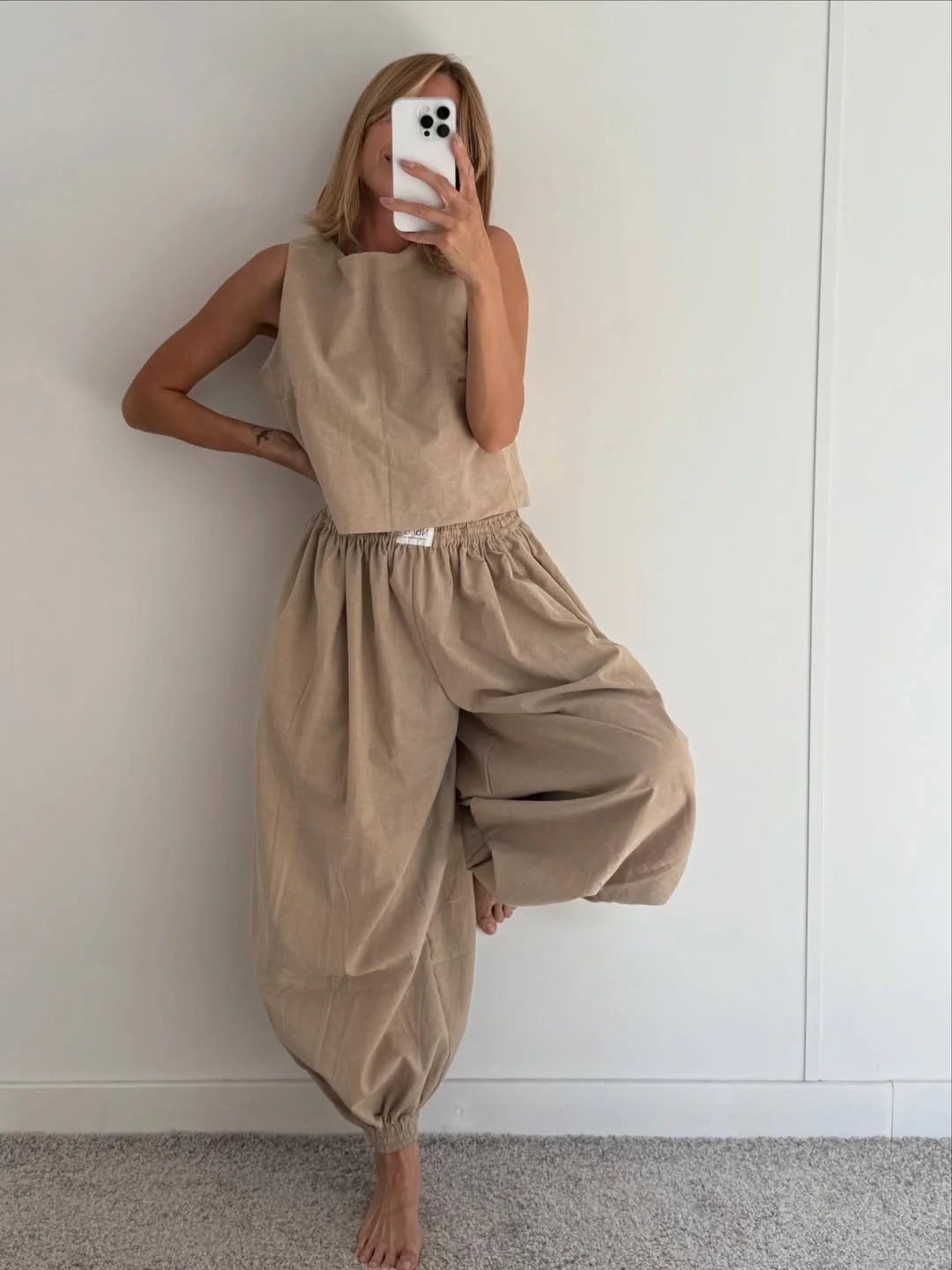 chic july fashion trends 2026 Relaxed Neutral Dressing With Sculptural Volume