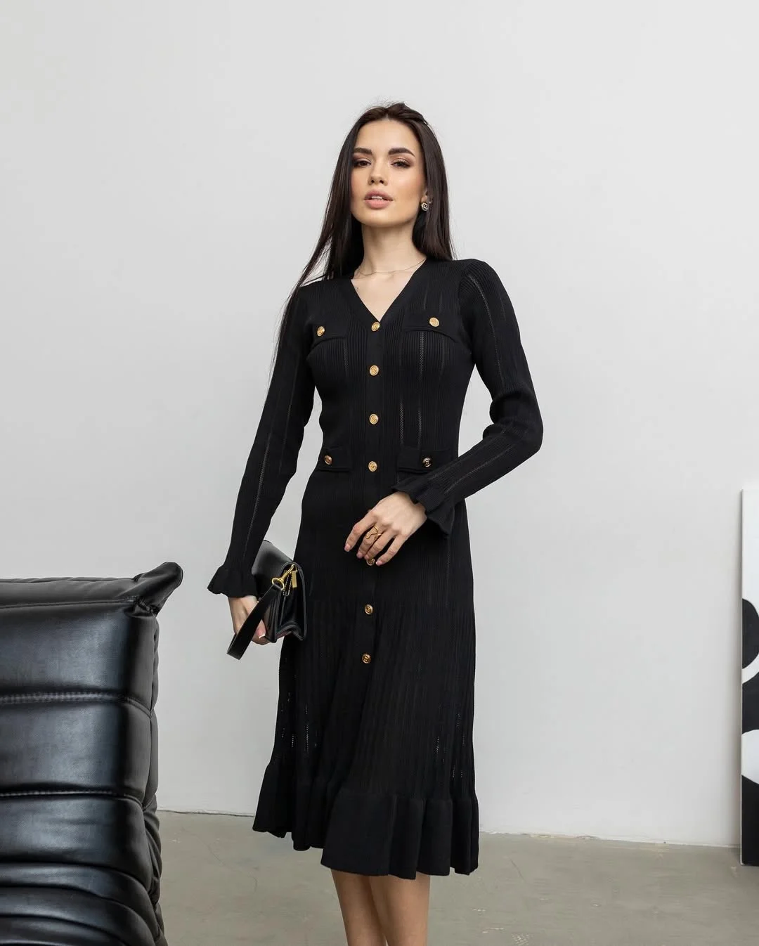 classy fall work outfits 2026 The Black Knit Dress That Means Business