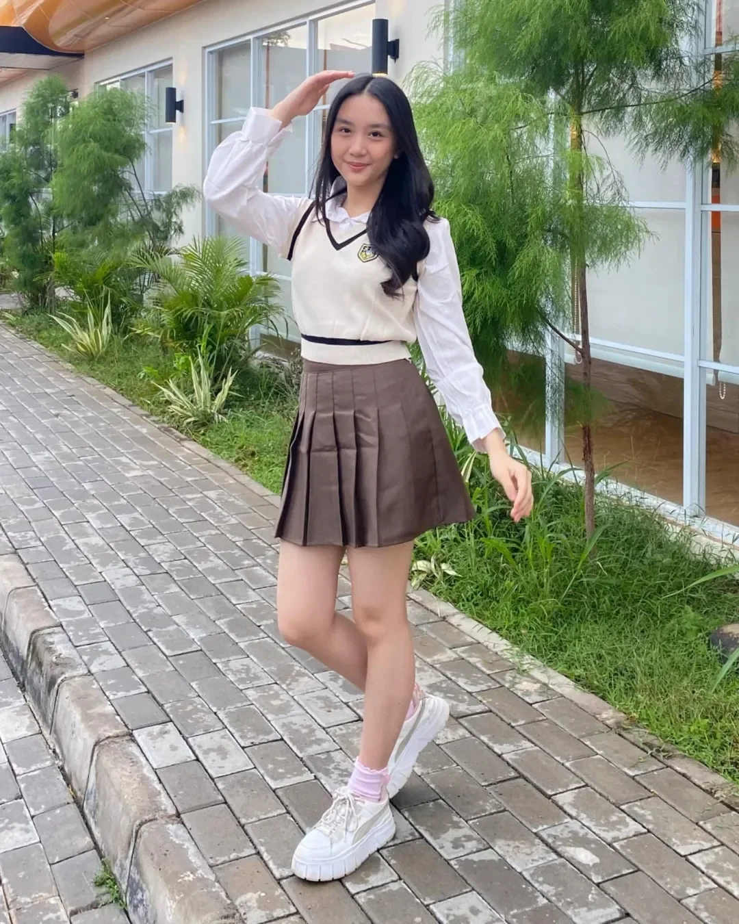 cute back to school outfits 2026 Preppy Skirt With Sporty Sneakers