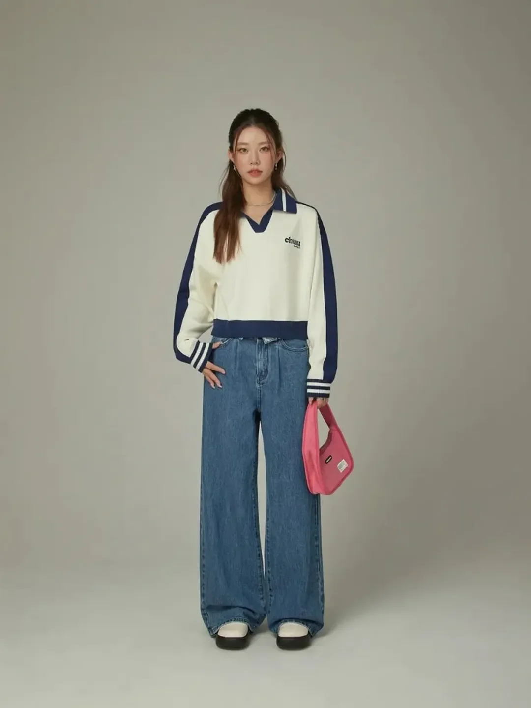 cute fall outfits with jeans and sneakers 2026 Sporty Knitwear and Denim for a Cute Campus-Inspired Look