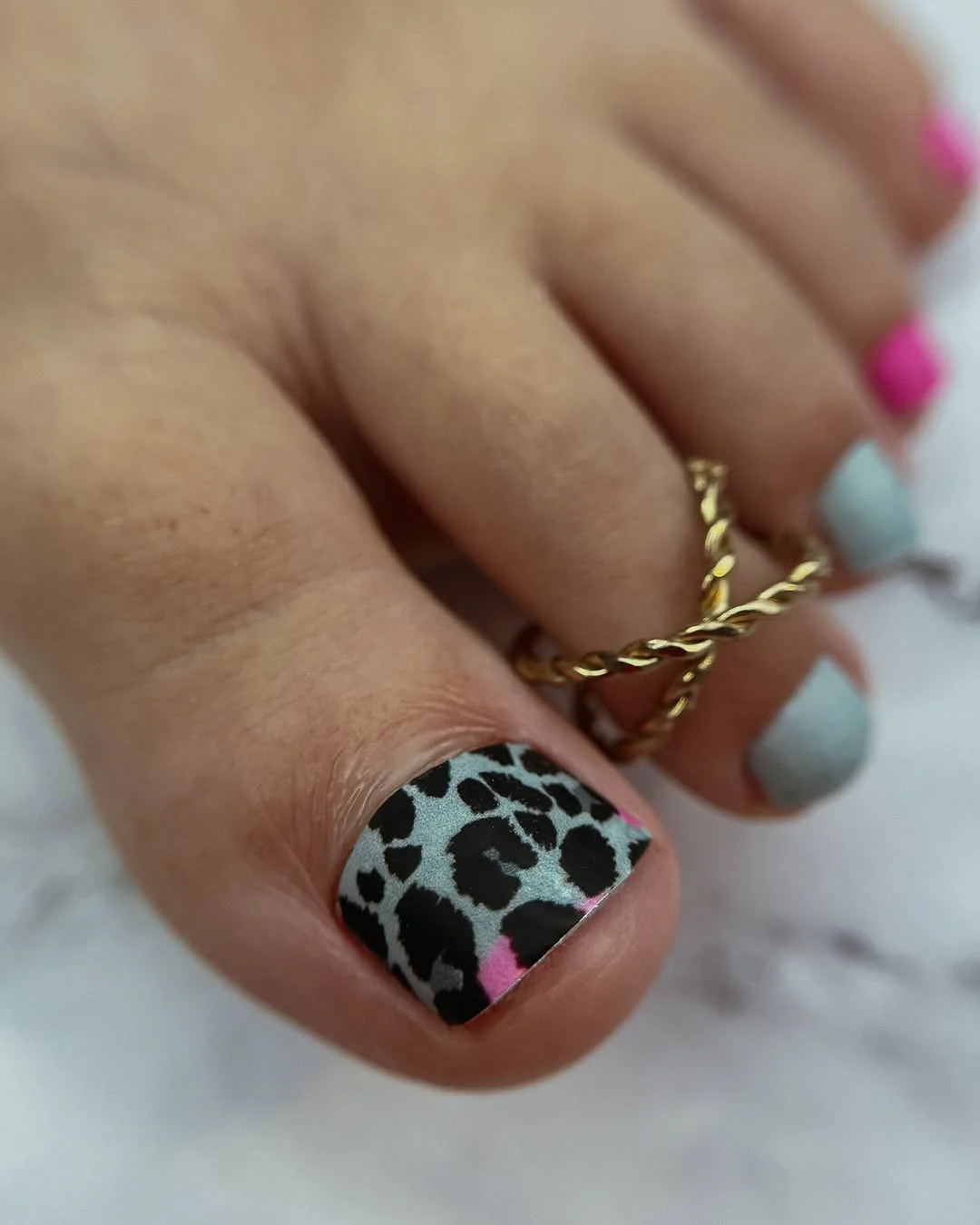 june pedicure ideas 2026 Playful Animal Print with Pops of Summer Color