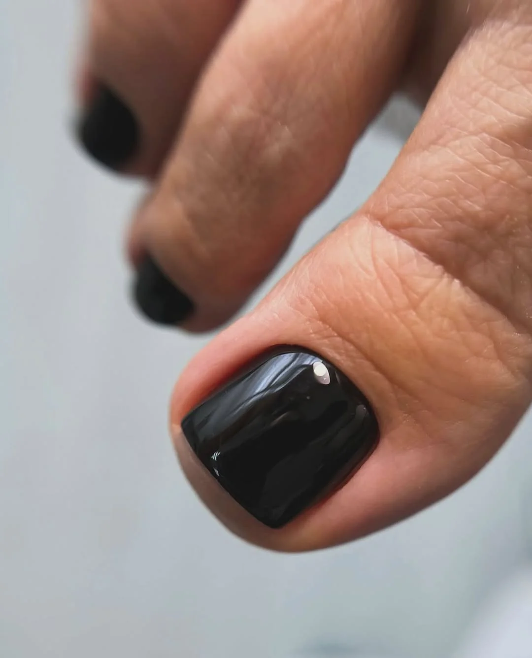 june pedicure ideas 2026 Glossy Black Pedicure for Minimalist Summer Style