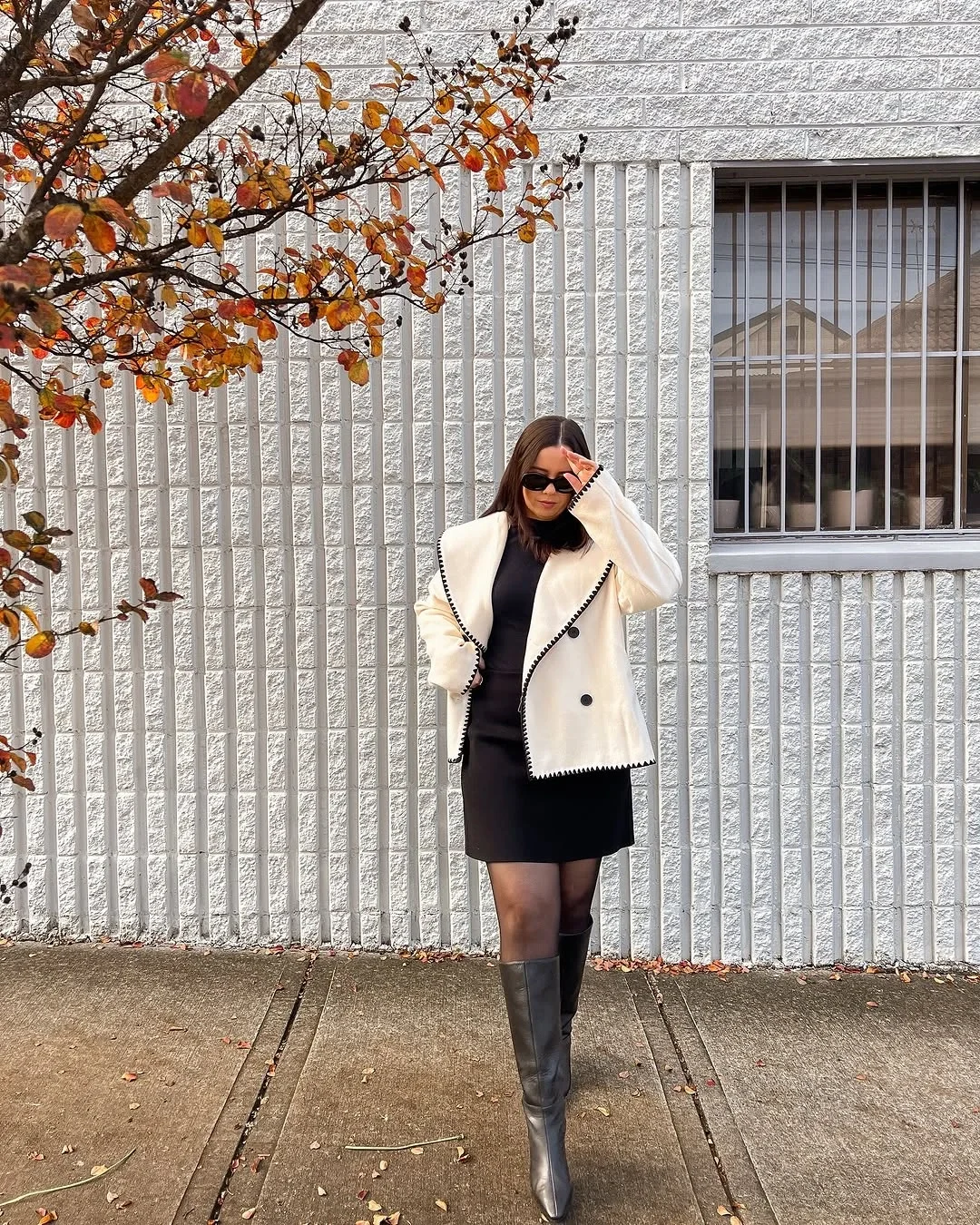 midsize fall fashion outfits 2026 Soft Contrast With a Cream Jacket and Sleek Black Layers