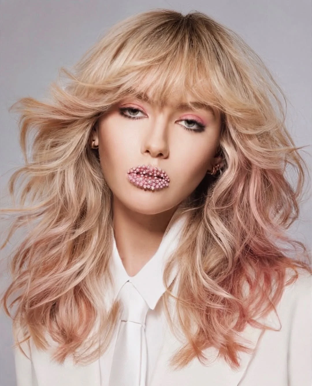 modern july hair colour ideas 2026 Rosy Champagne Waves