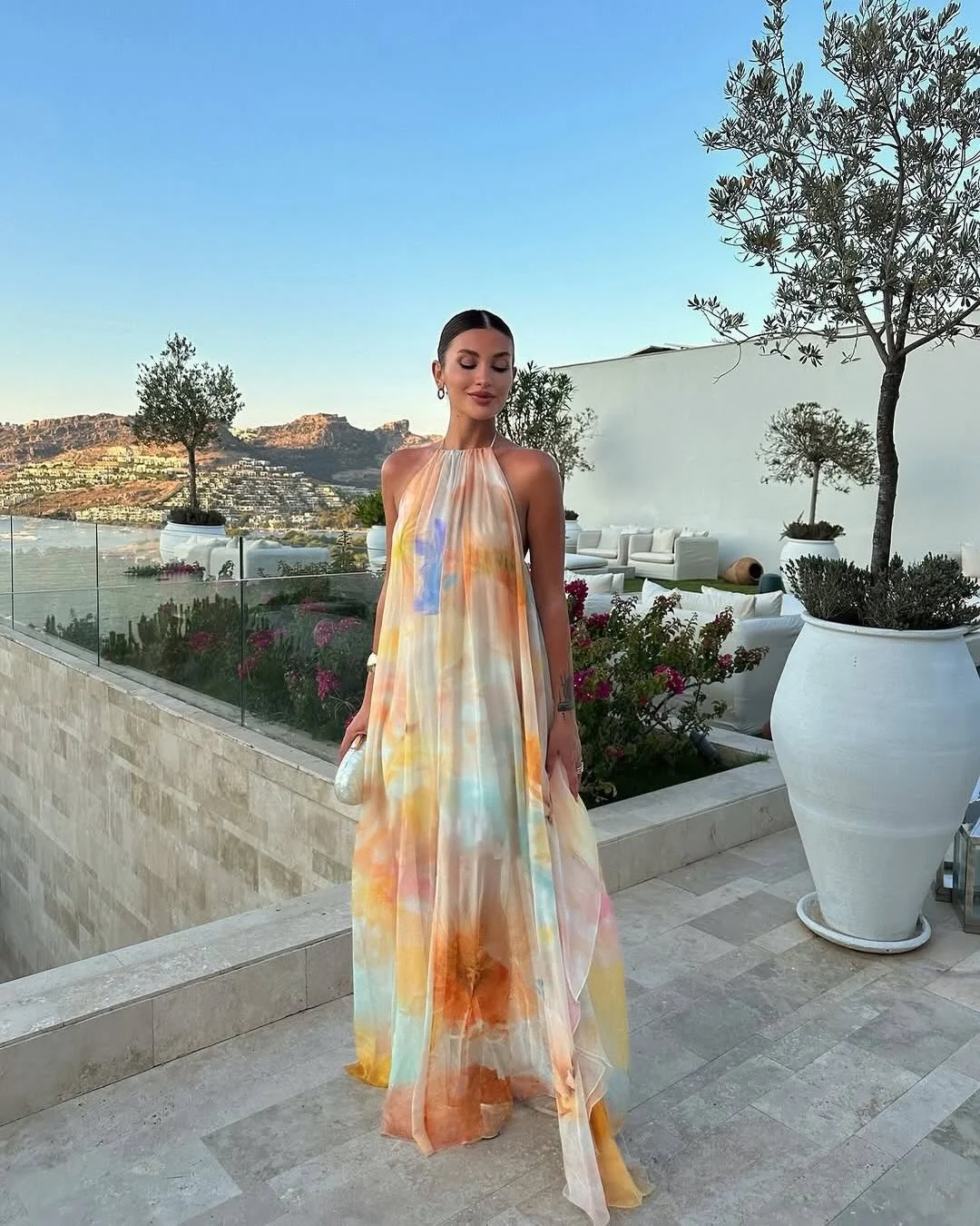 stylish early summer outfits 2026 Soft Watercolor Dresses That Capture Summer Light