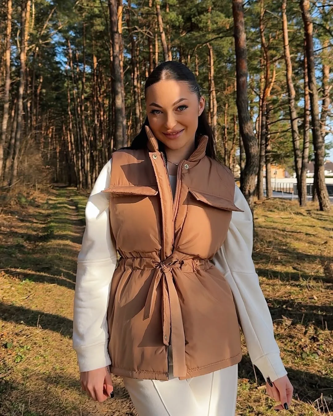 stylish fall outfits with vests 2026 A Belted Puffer Vest That Defines the Waist