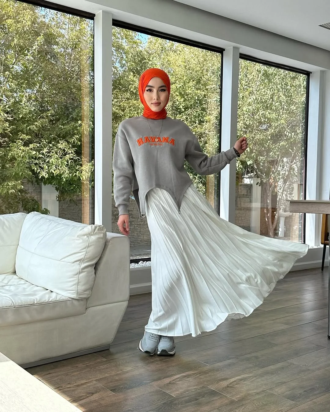 stylish fall skirt and sneakers outfits 2026 Flowy Pleats and Soft Autumn Layers
