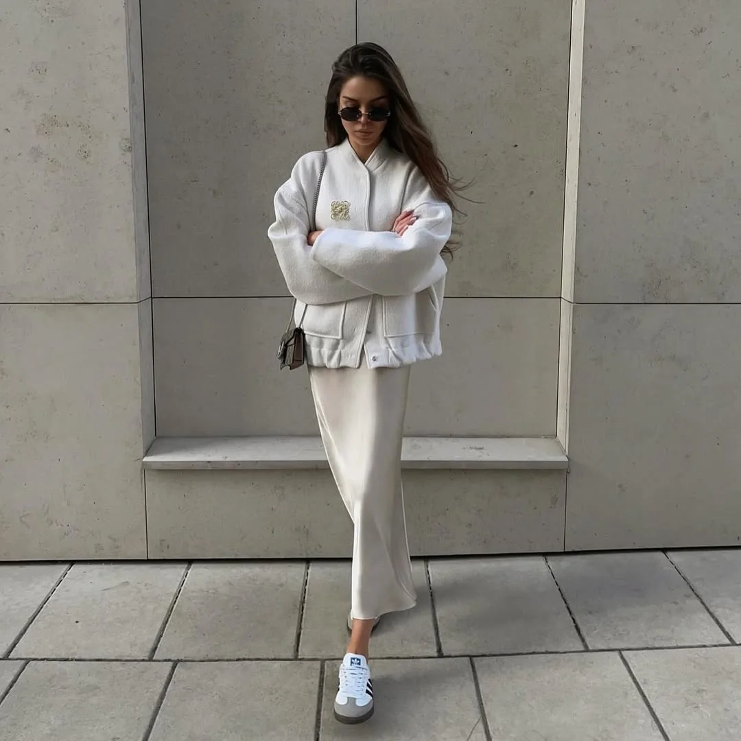 stylish fall skirt and sneakers outfits 2026 Monochrome Cream Layers That Feel Quietly Luxurious