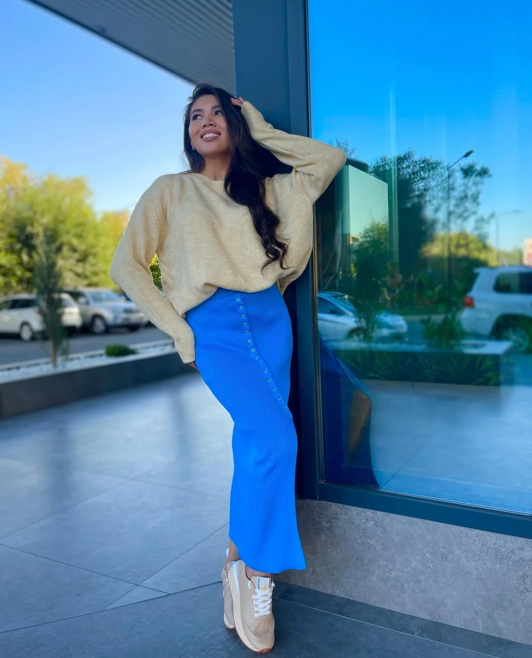stylish fall skirt and sneakers outfits 2026 Bold Blue Midi Skirt Paired With a Cozy Sweater