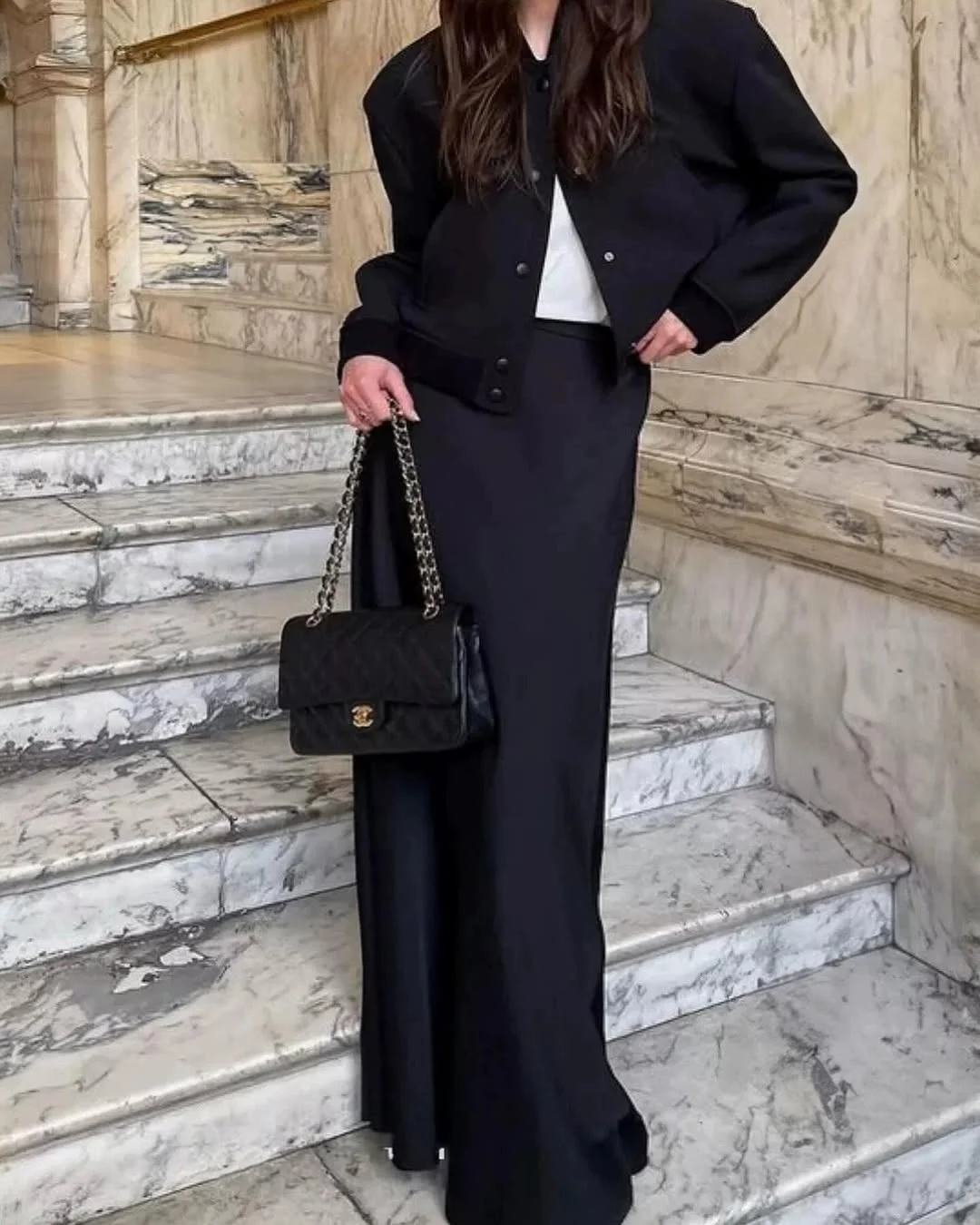 stylish fall skirt and sneakers outfits 2026 Elegant Black Long Skirt With Modern Tailoring
