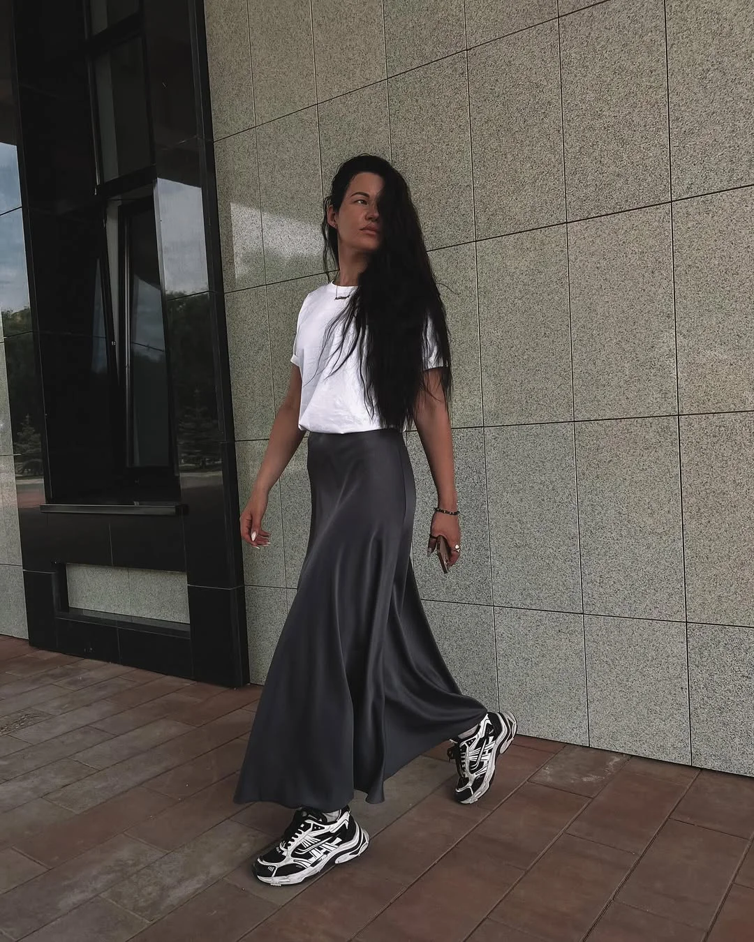 stylish fall skirt and sneakers outfits 2026 Black Satin Maxi Skirt With Athletic Sneakers