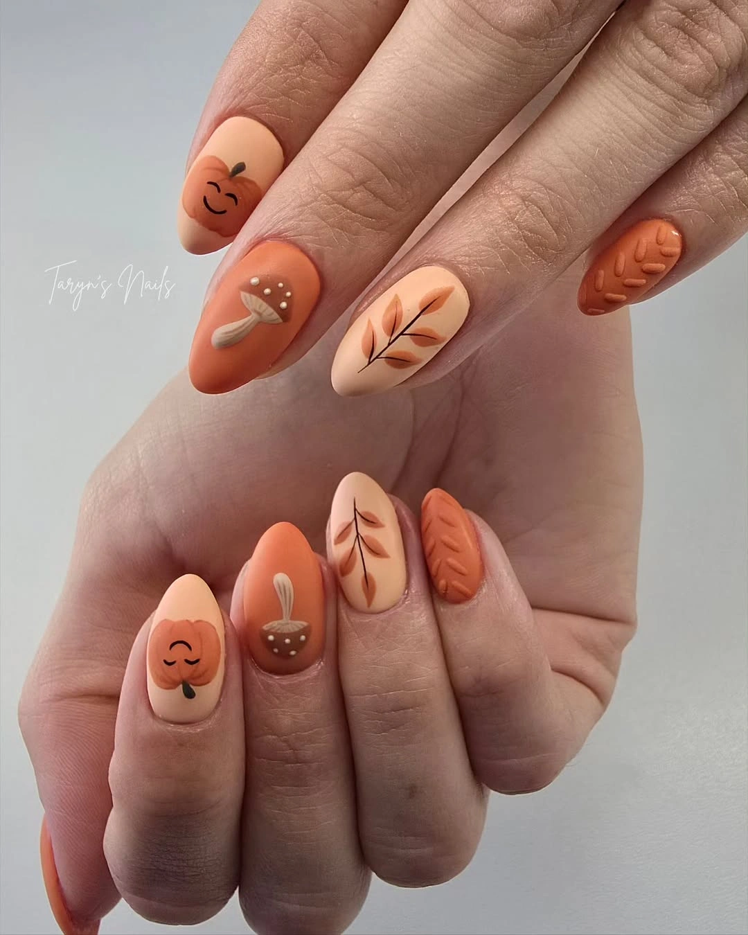 chic fall almond nails 2026 Cozy Pumpkin And Autumn Leaf Almond Nails