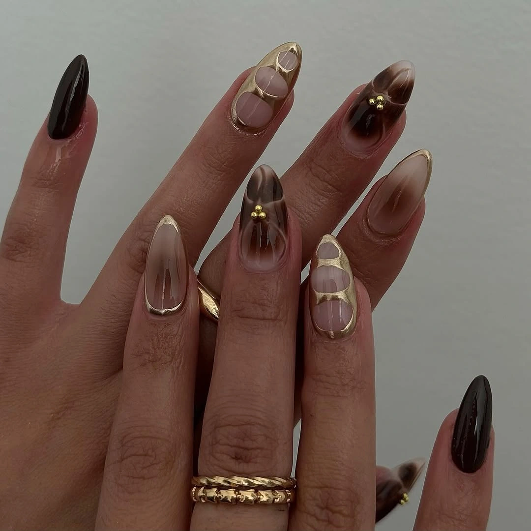 chic fall almond nails 2026 Mocha Marble With Liquid Gold Details
