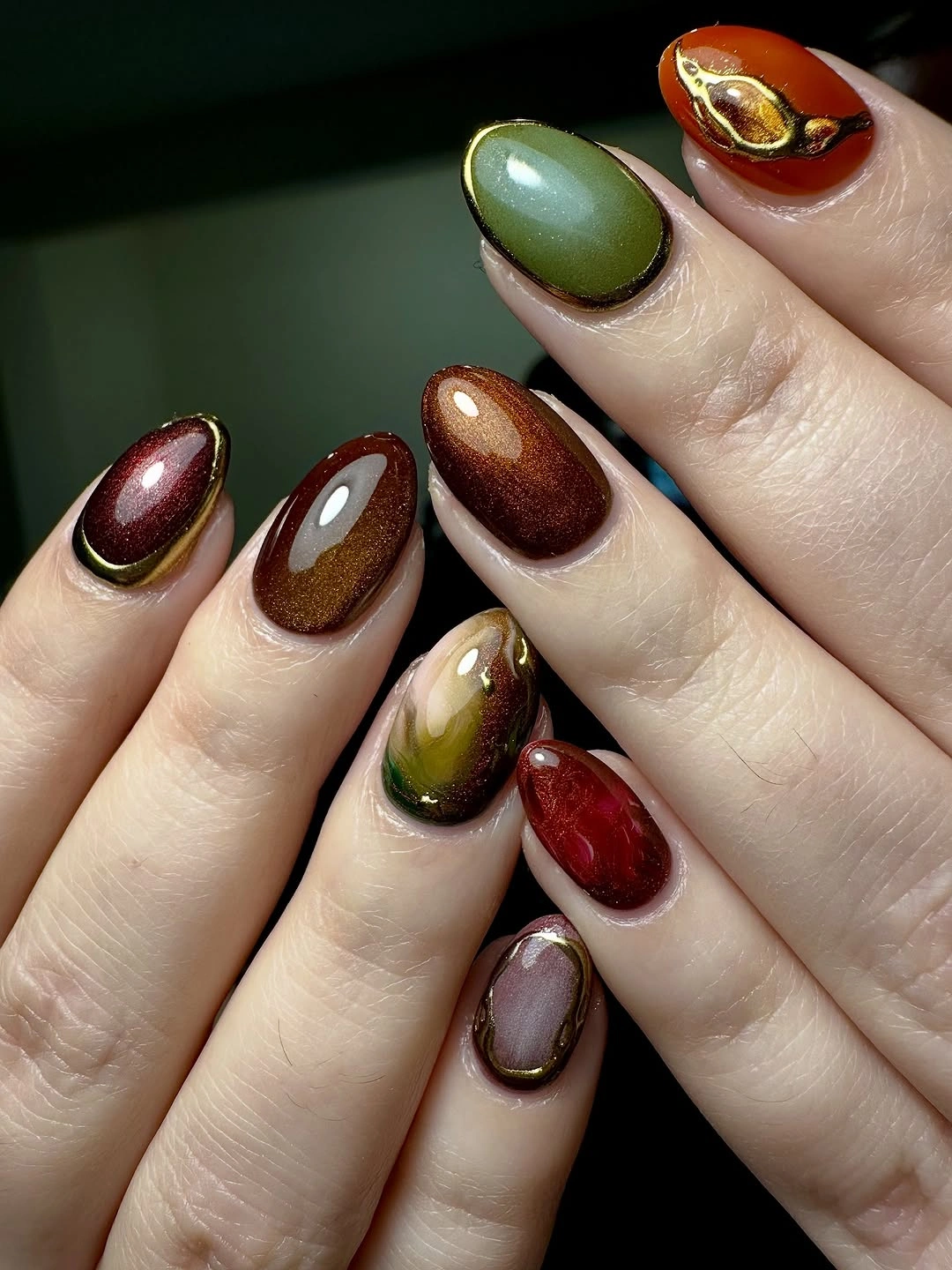 chic september nails color 2026 Earthy Jewel Tone Autumn Palette