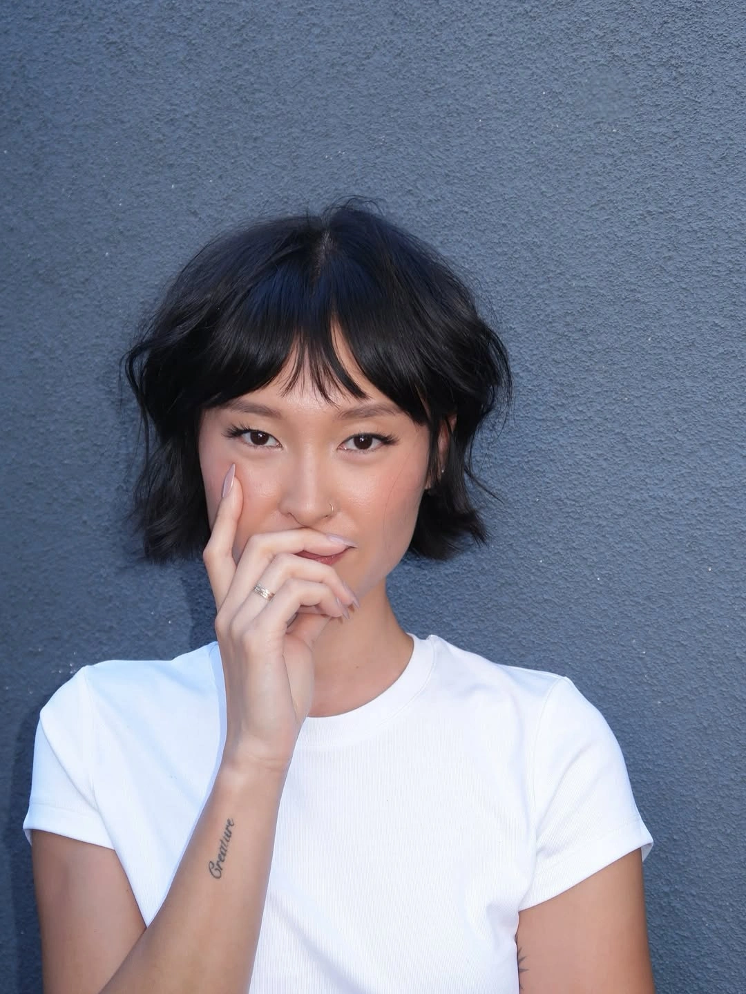 chic short bobbed hairstyle Soft French Texture With Effortless Fringe
