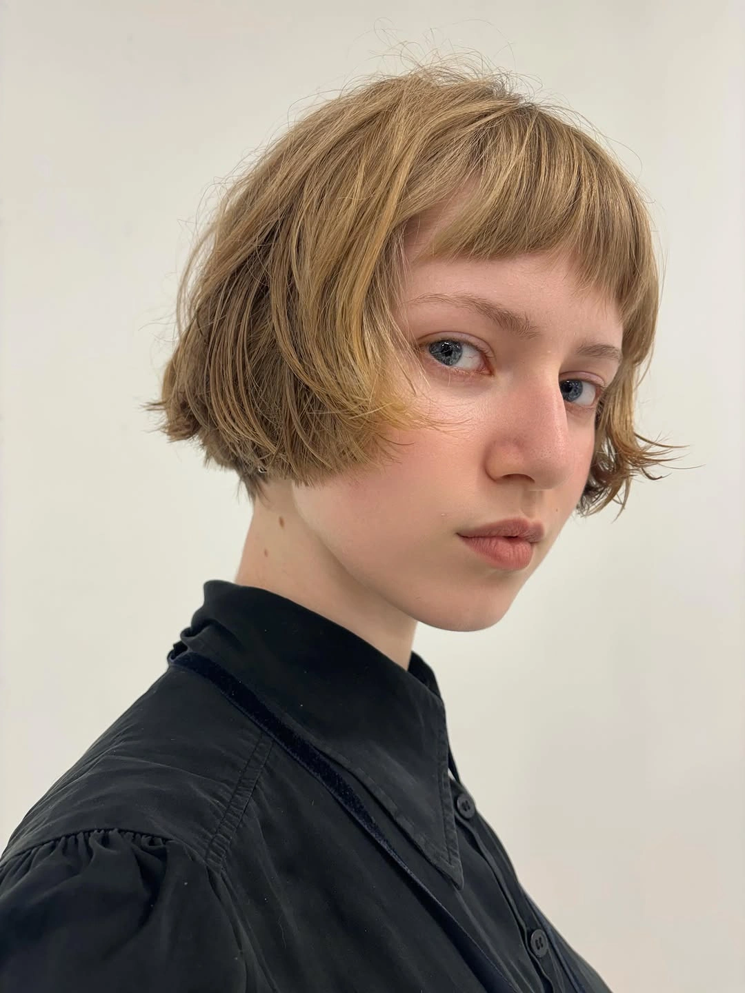 chic short bobbed hairstyle Playful French Bob With Baby Bangs
