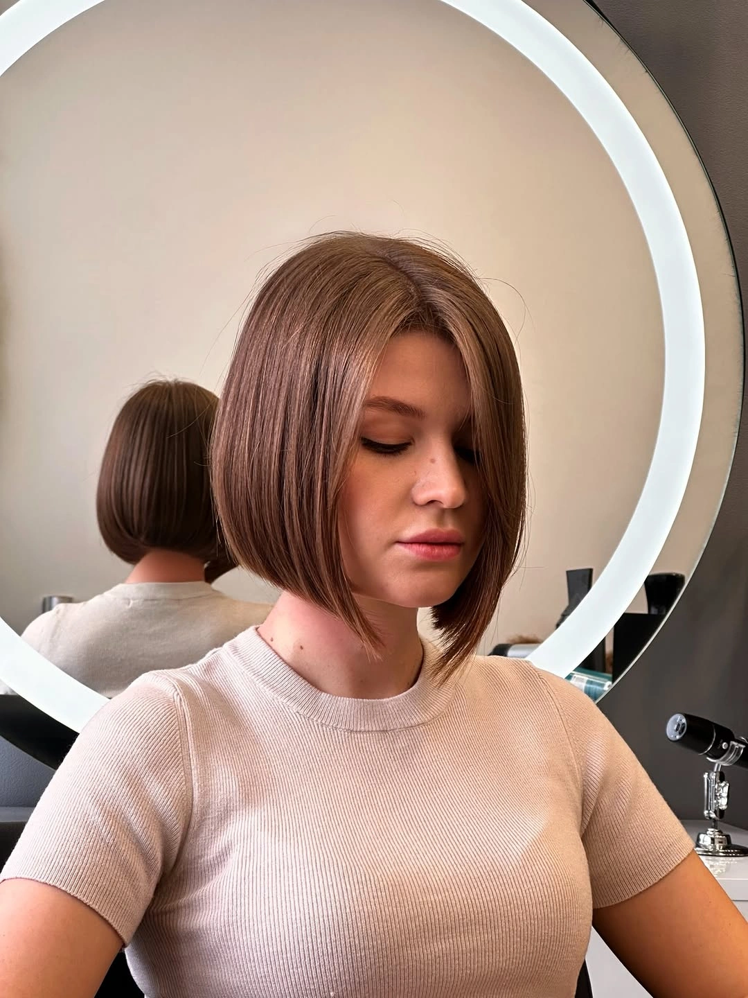 chic short bobbed hairstyle Elegant Angled Bob With Smooth Finish
