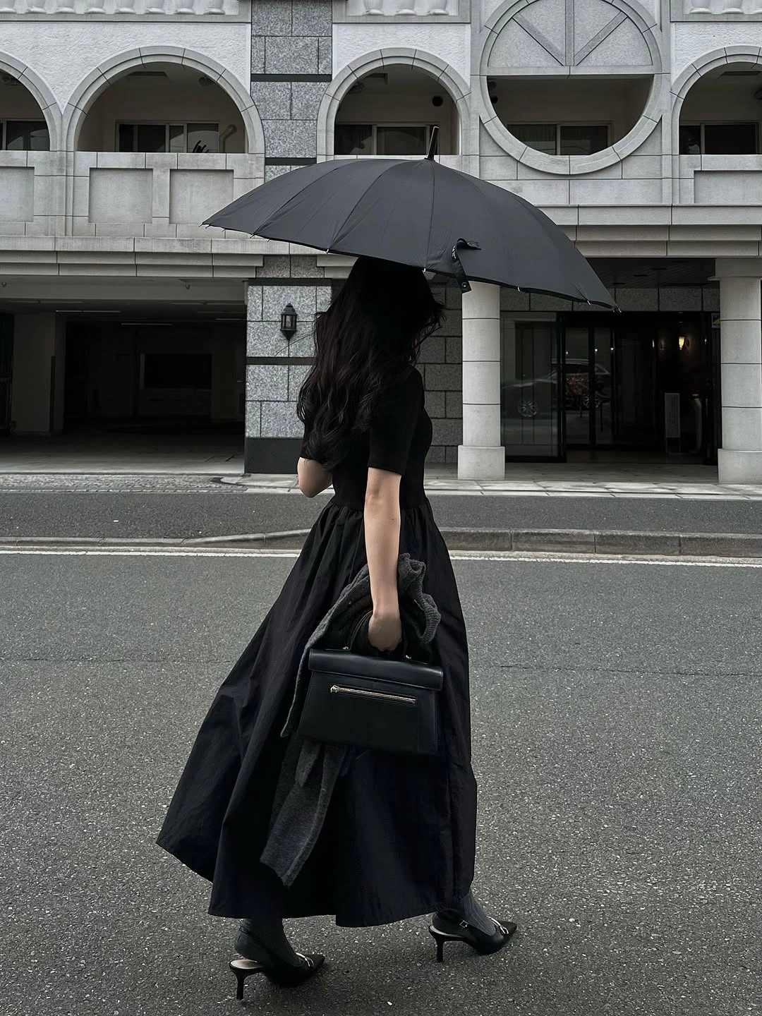classic fall outfits 2026 Elegant Black Dress For Rainy Autumn Days