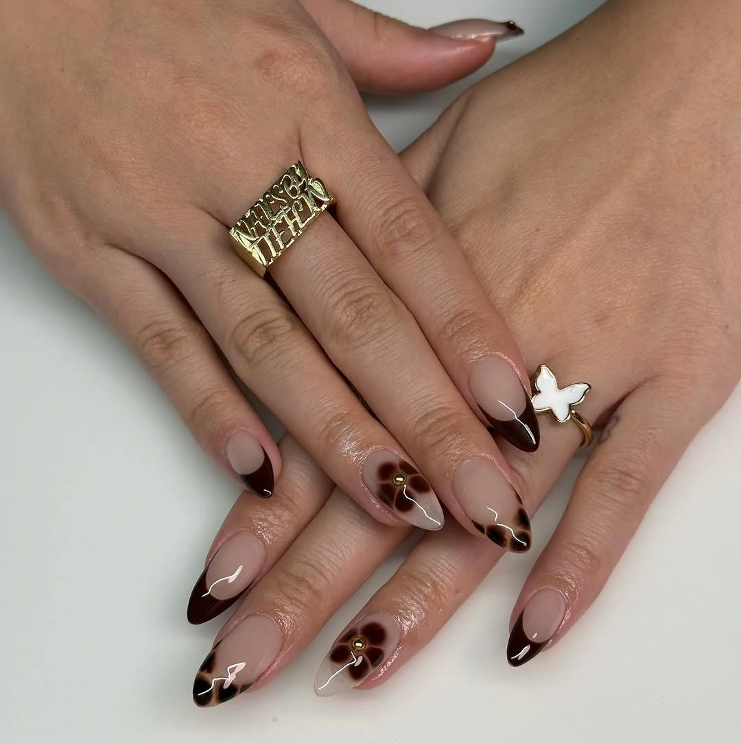 creative fall medium nail ideas 2026 Moody Espresso French Tips With Floral Accents