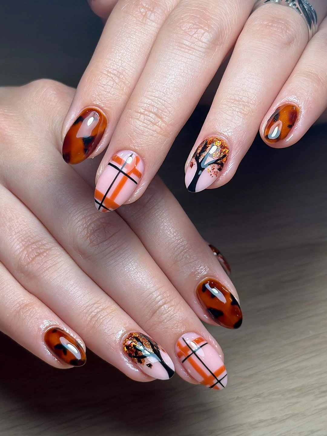 creative fall medium nail ideas 2026 Autumn Plaid And Amber Tortoiseshell Mix