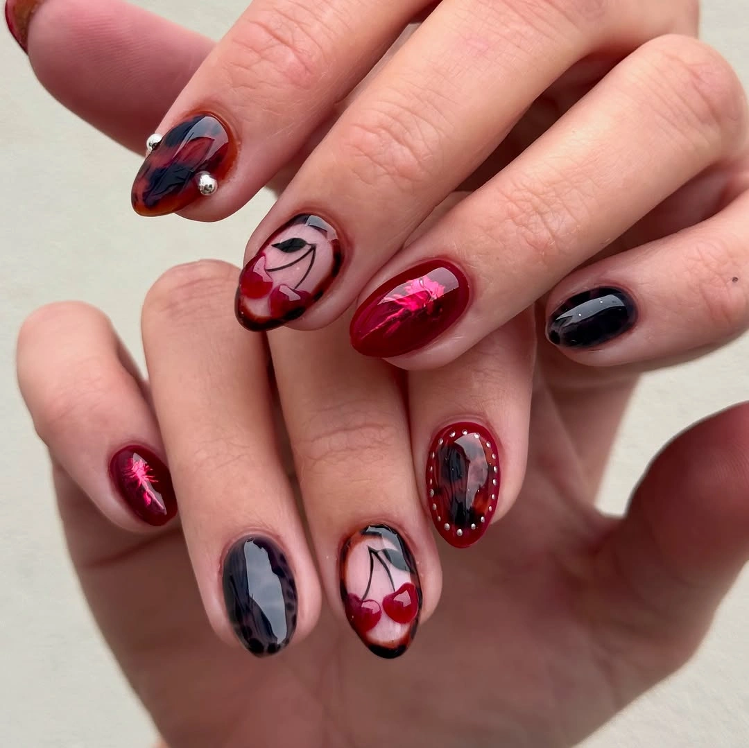 creative fall medium nail ideas 2026 Dark Cherry Glass Nails With Bold Fruit Art
