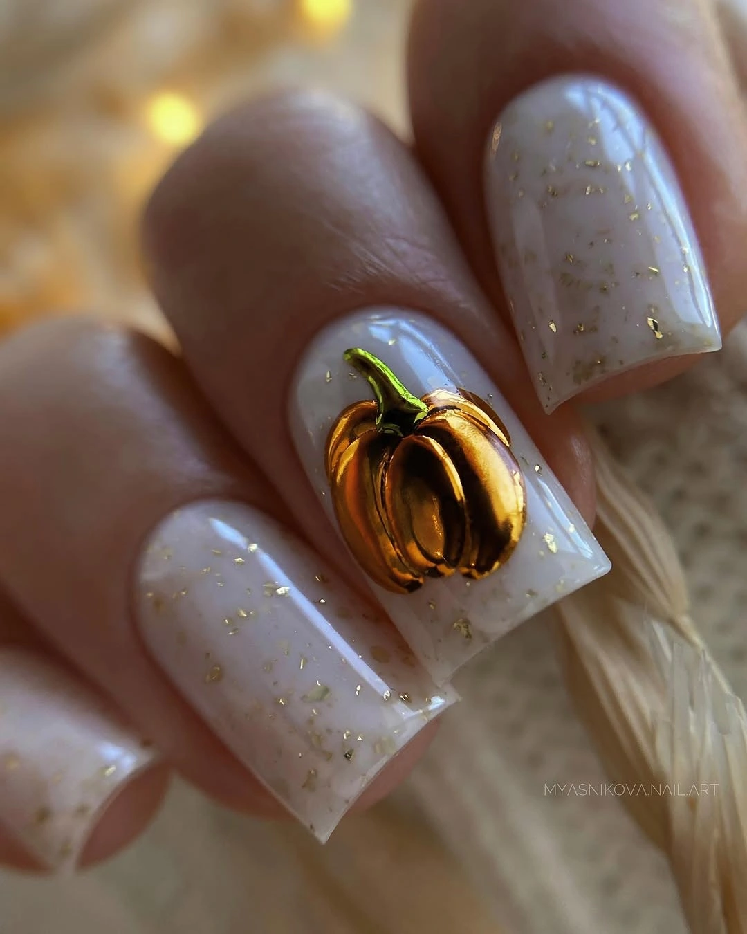 creative fall nail art 2026 Golden Pumpkin Accent With Soft Milky Nails
